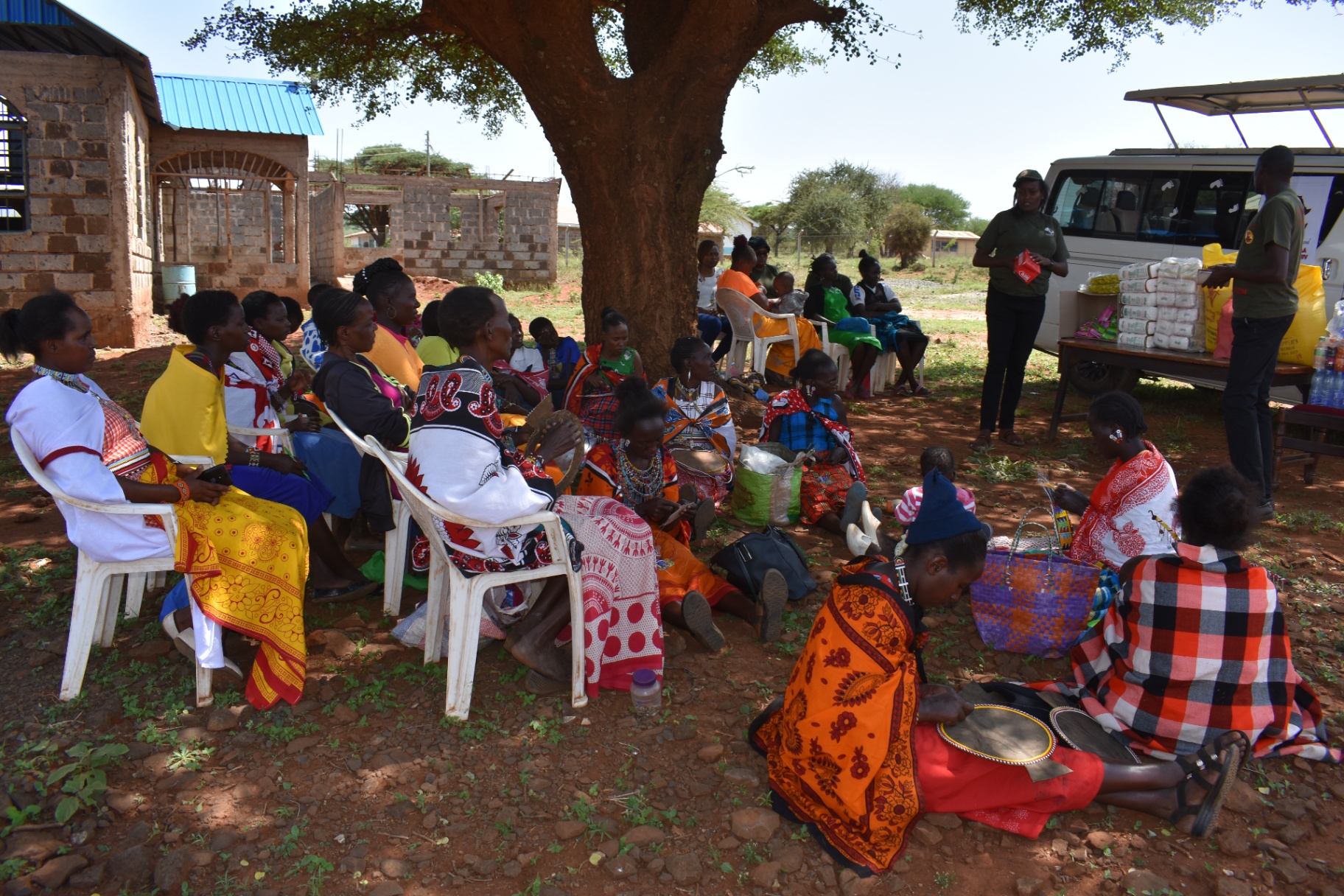Women under acacia tree